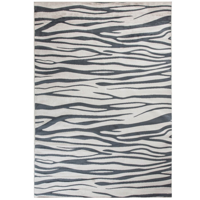Dywan zebra EBONY. Przybliżenie dywanu z wiskozy w nowoczesny nieregularny wzór w kolorach jasnych i ciemno szarych. Skandynawskie wzornictwo