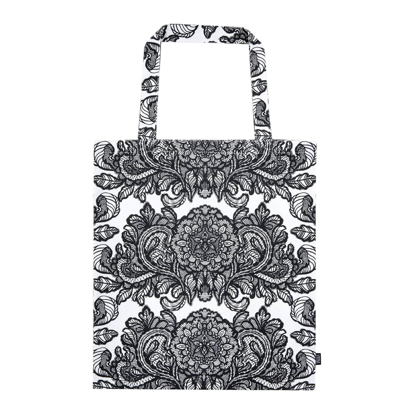 Elegancka torba bawełniana ALEKSANTERI. Czarny graficzny wzór stylizowanych kwiatów i liści konwalii na białym tle. Torba bawełniana na zakupy widoczna w całości. Skandynawski design