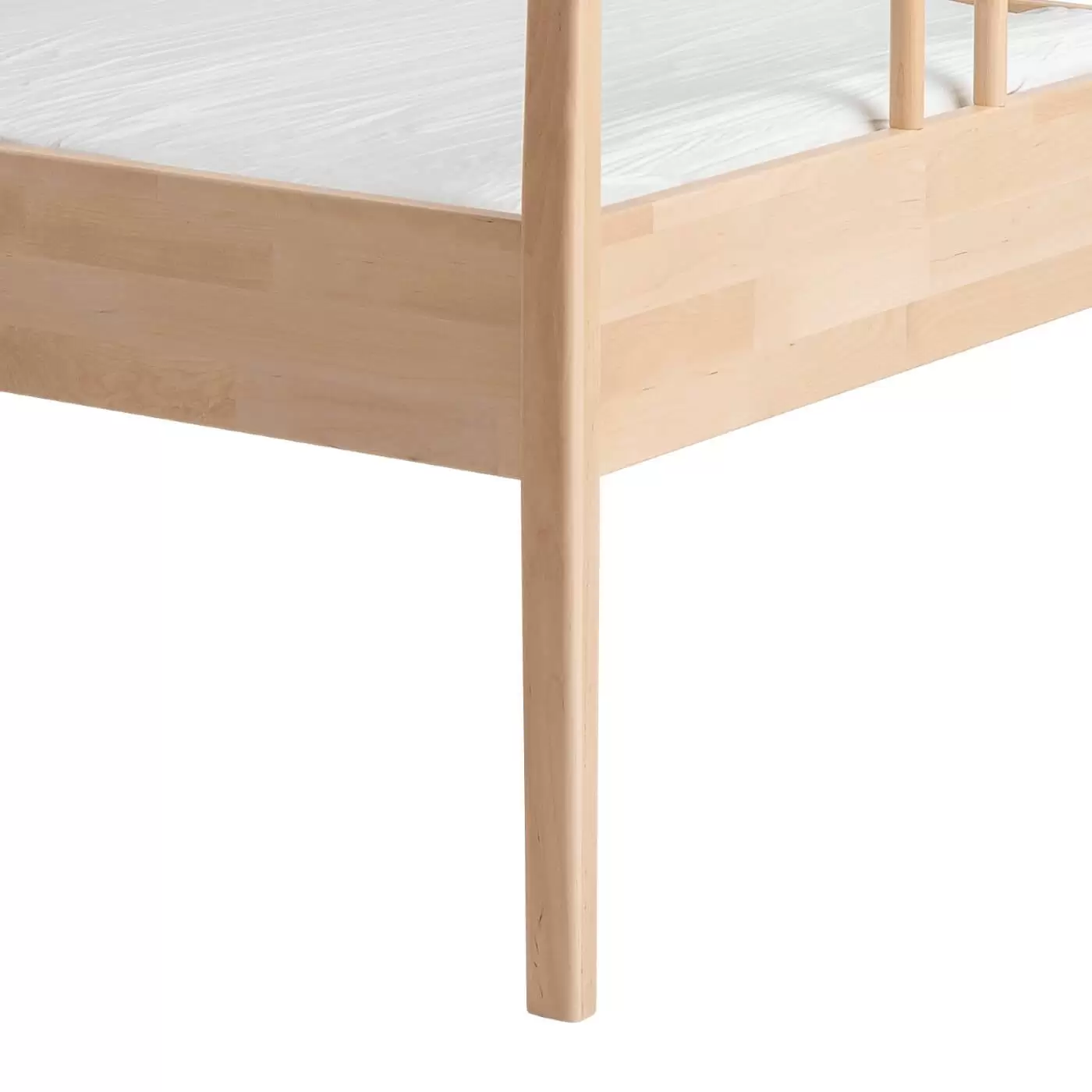 Łóżko drewniane 90x200 NOEL. Przybliżony widok wysokiej nóżki z litego drewna brzozy skandynawskiej. Nowoczesny design