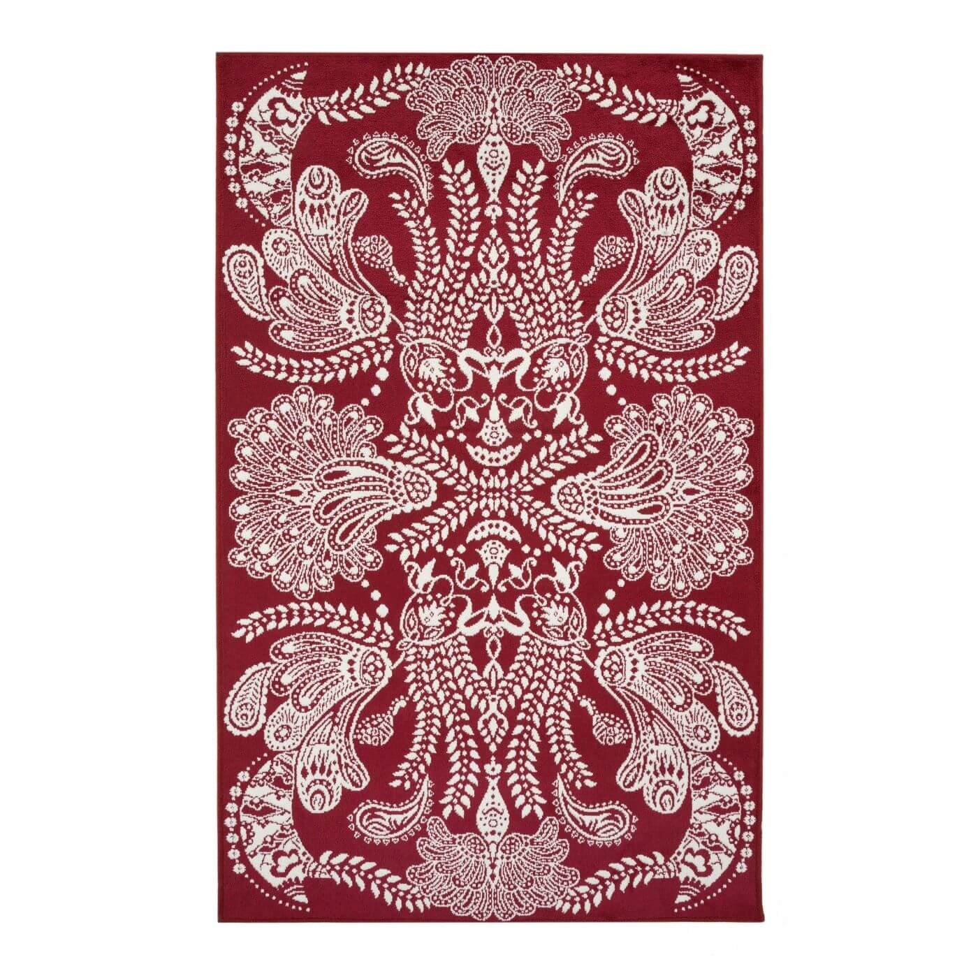 Stylowy dywan SYVÄMARI. Dekoracyjny czerwony mały dywan stylowy do salonu o bogatym białym wzorze. Dywanik czerwono biały widoczny w całości. Skandynawski design