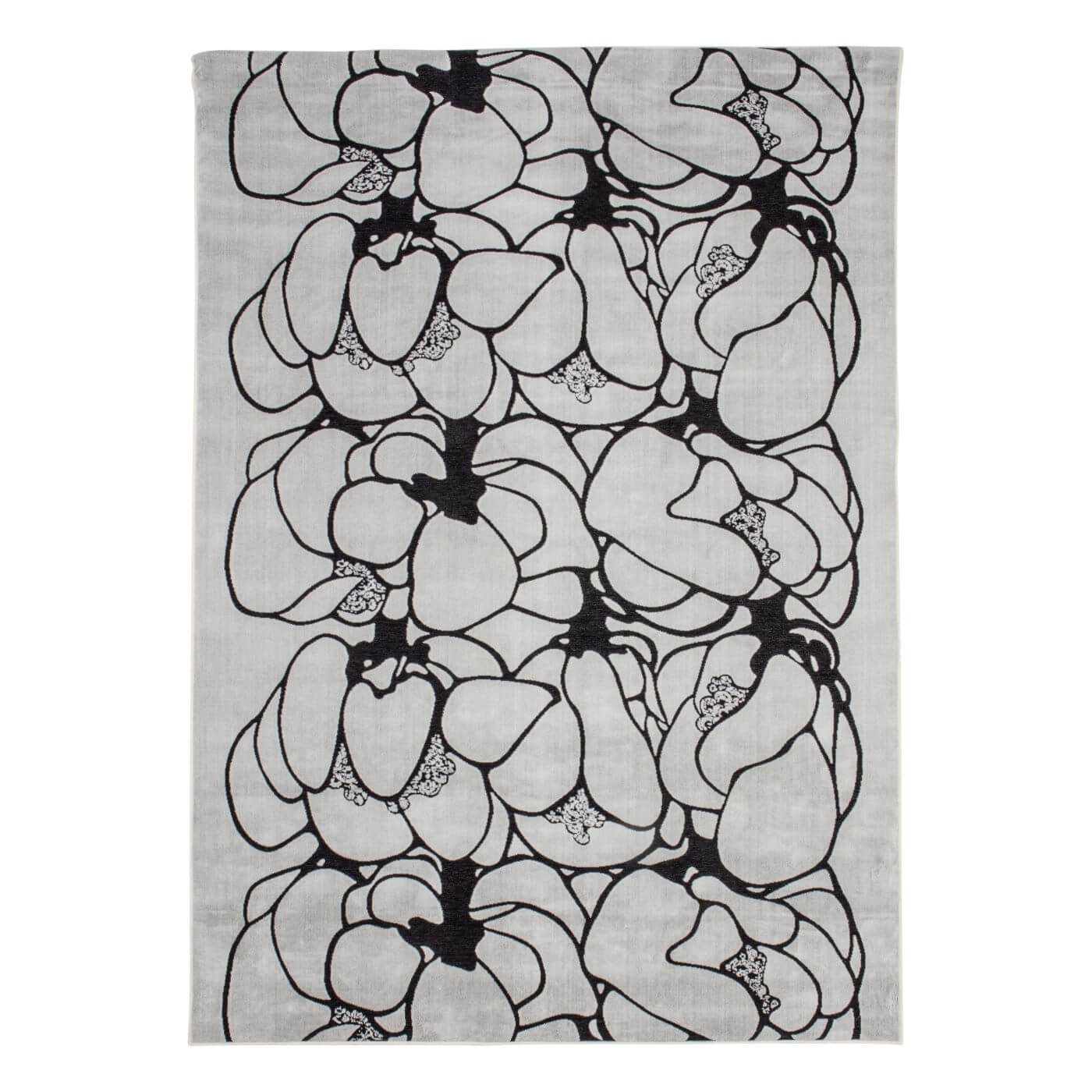 Dywan design MAKEBA. Designerski dywan biały z czarnym wzorem w duże kwiaty z krótkim włosiem przyjazny dla alergika. Nowoczesny dywan do salonu o skandynawskim designie widoczny w całości