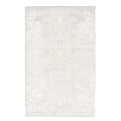 Dywanik dekoracyjny beżowy SYVÄMERI. Dekoracyjny z białym stylowym wzorem beżowy dywanik z wiskozy z połyskiem do sypialni lub salonu. Skandynawski design
